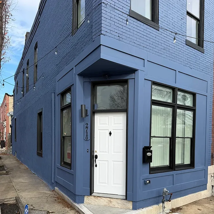 Renovated blue corner rowhome near Patterson Park in Baltimore