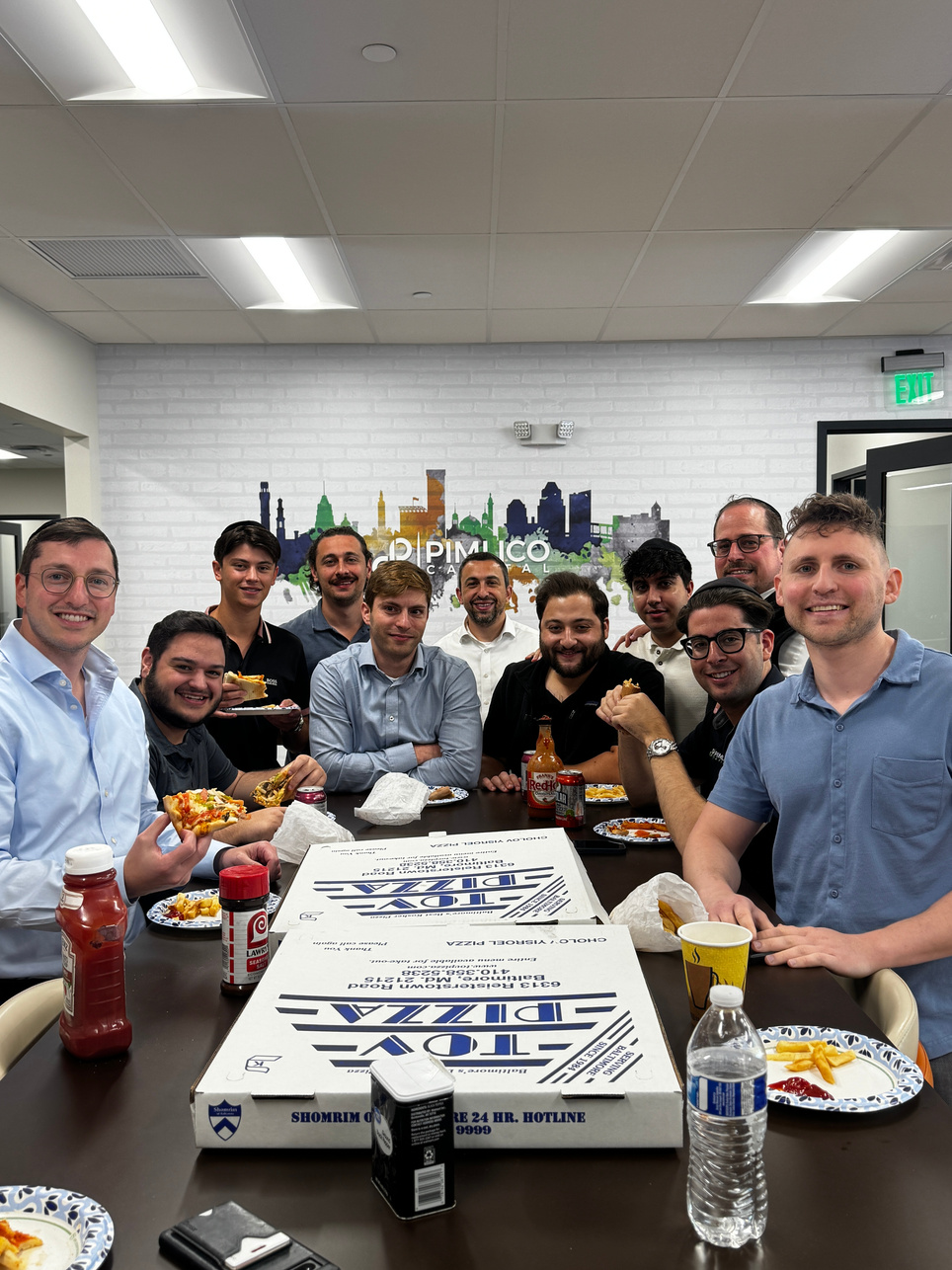 Team pizza lunch in the Baltimore office